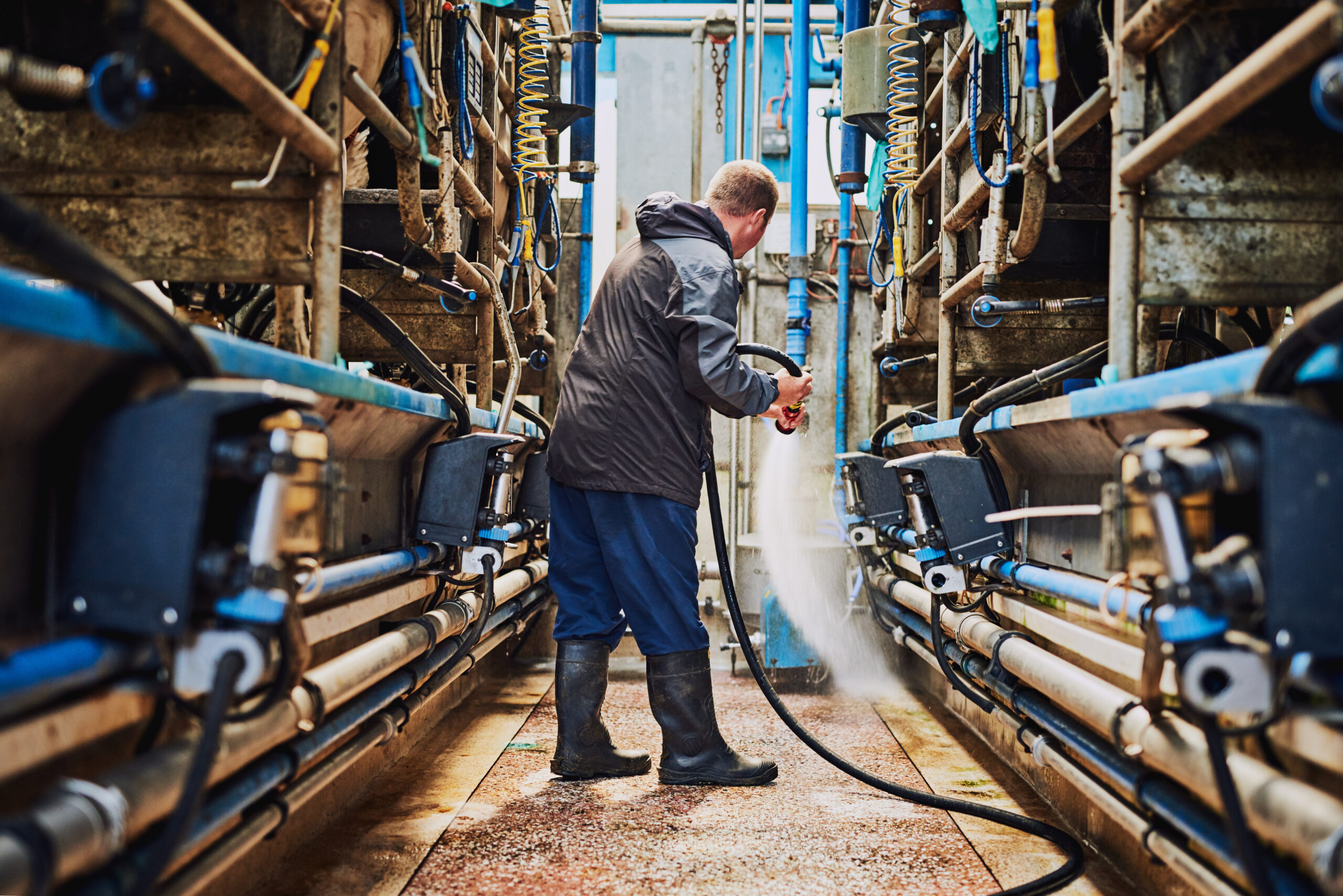 Cleaning off the factory floor.