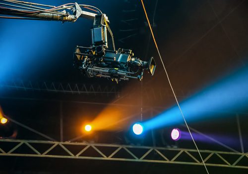 TV camera on crane on concert. TV camera